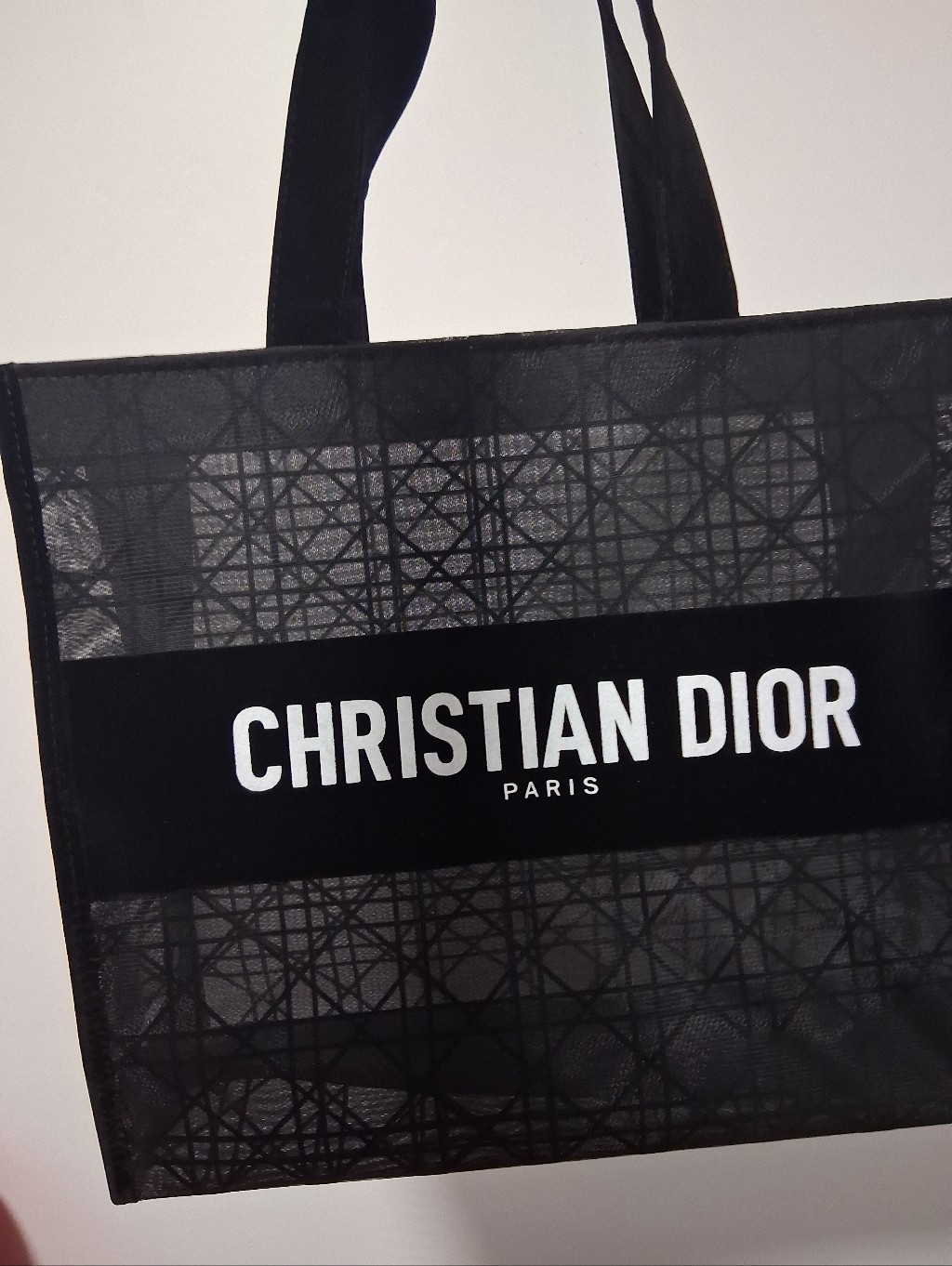 Black Mesh Tote Bag With Geometric Pattern White Logo.